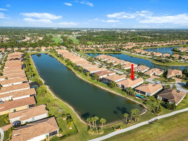 aerial view with a water view and a residential view