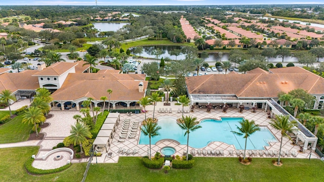 bird's eye view featuring a residential view and a water view