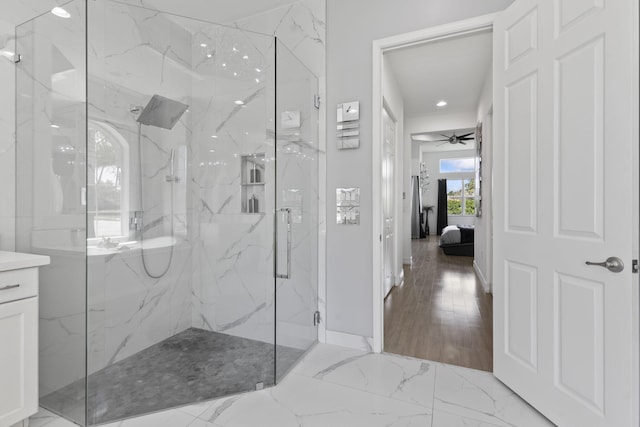 full bath featuring marble finish floor, a marble finish shower, and ensuite bathroom