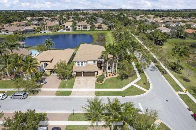 aerial view with a water view and a residential view