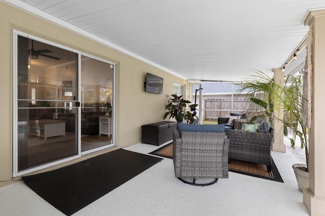 view of patio / terrace featuring fence and an outdoor living space