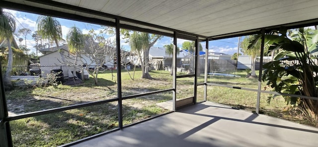 sunroom with a residential view