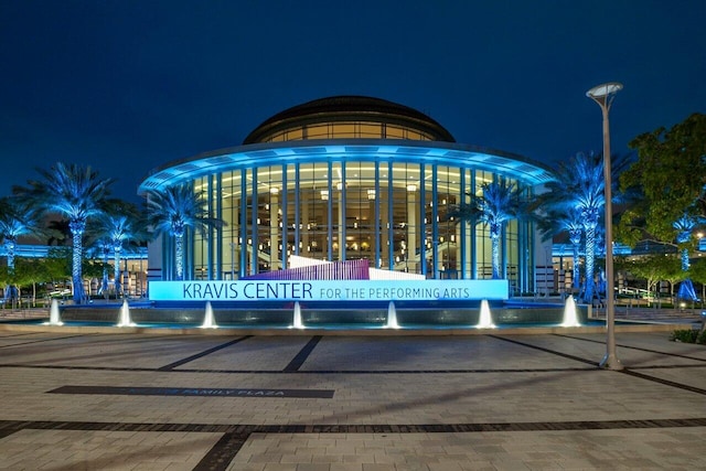 view of gate at night