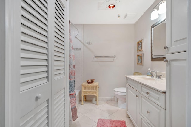 bathroom with toilet, vanity, baseboards, tile patterned floors, and shower / bath combination with curtain