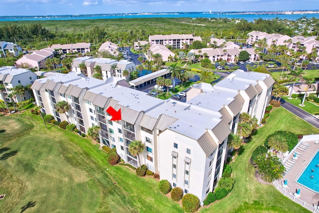 aerial view featuring a residential view and a water view