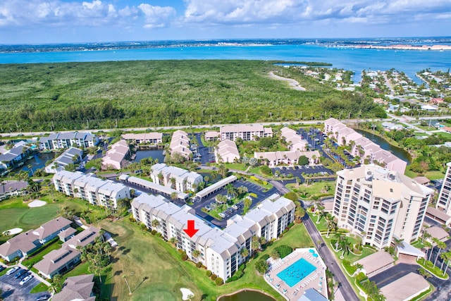 birds eye view of property featuring a water view