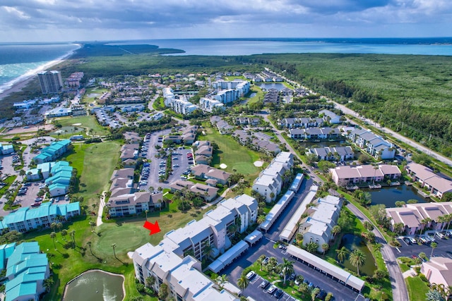 bird's eye view with a water view and a residential view