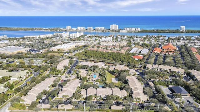 drone / aerial view with a water view