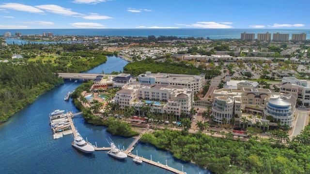 aerial view featuring a water view and a view of city