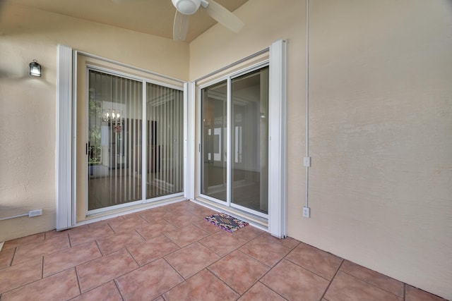 view of patio featuring ceiling fan