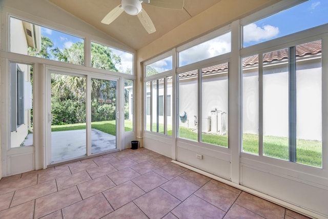 unfurnished sunroom with lofted ceiling and ceiling fan