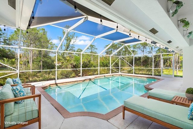 pool featuring a patio and a lanai