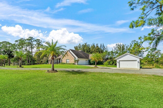 exterior space with a garage and a front yard