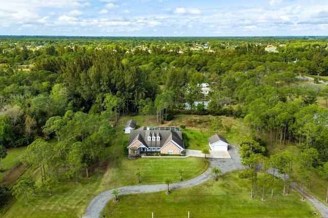 aerial view featuring a view of trees