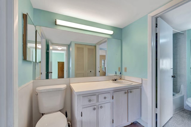 full bath featuring a closet, shower / tub combination, vanity, and toilet