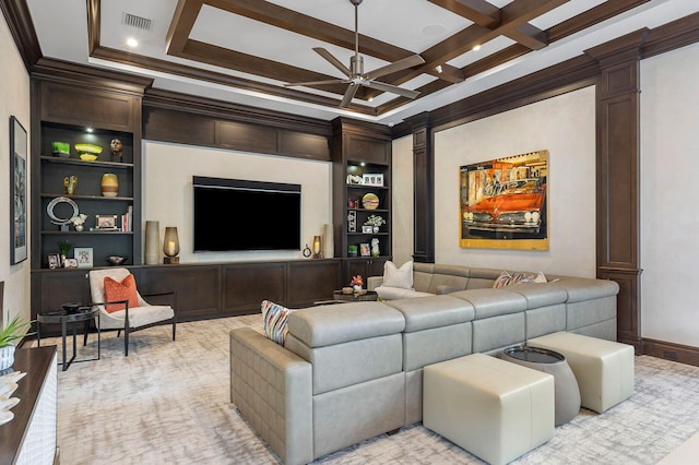 living area featuring built in features, a ceiling fan, visible vents, ornate columns, and coffered ceiling