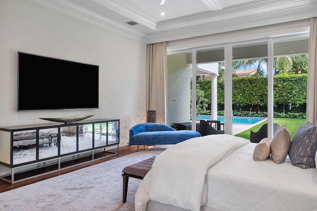 bedroom featuring visible vents, wood finished floors, crown molding, and access to outside