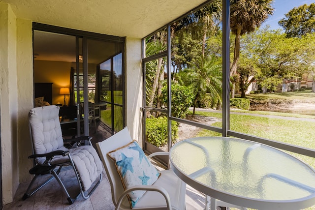 sunroom with plenty of natural light