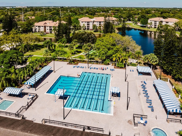 view of pool with a water view