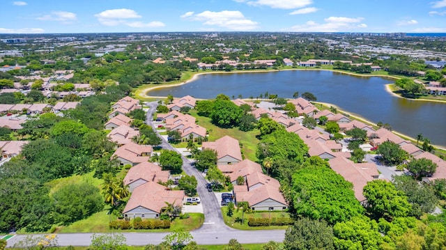 birds eye view of property with a residential view and a water view