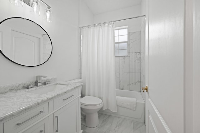 full bath featuring marble finish floor, shower / bath combo with shower curtain, vanity, and toilet