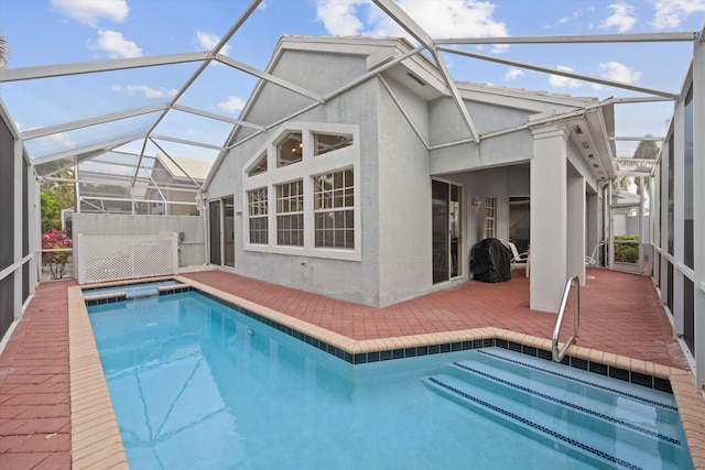 outdoor pool featuring a lanai