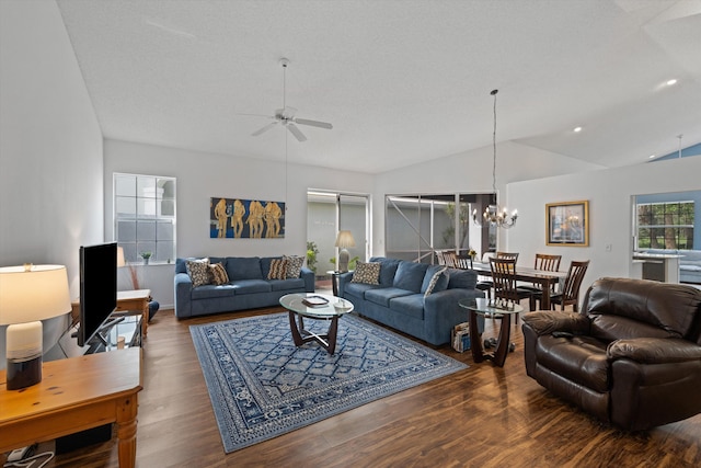 living room with recessed lighting, vaulted ceiling, wood finished floors, and ceiling fan with notable chandelier