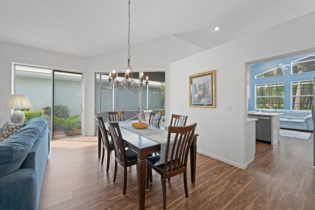 dining area with a chandelier, recessed lighting, dark wood finished floors, and baseboards