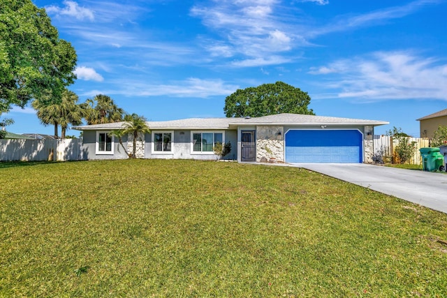 single story home with stone siding, a front yard, a garage, and fence