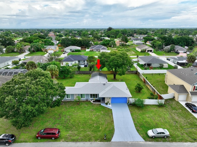 drone / aerial view with a residential view