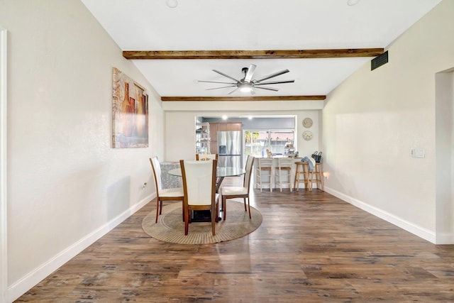 dining space featuring visible vents, vaulted ceiling with beams, baseboards, wood finished floors, and a ceiling fan