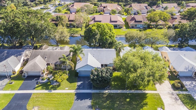 aerial view featuring a water view and a residential view