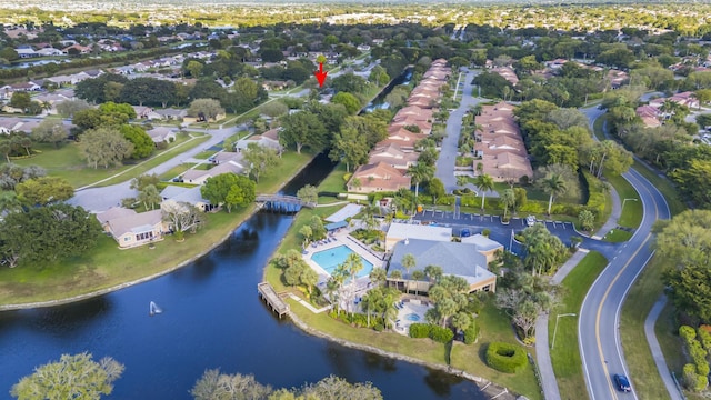 aerial view featuring a water view and a residential view