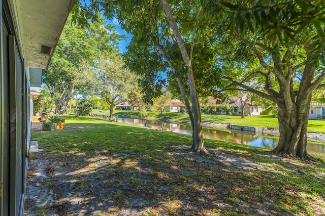 view of yard with a water view