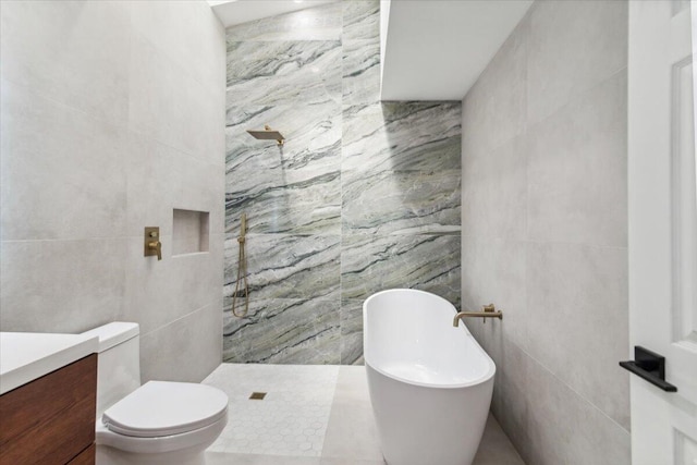 full bathroom featuring a freestanding bath, tile walls, and a walk in shower