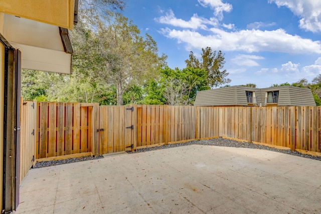 view of patio / terrace with a gate and a fenced backyard