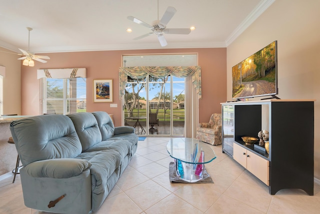 living room with ceiling fan, recessed lighting, crown molding, and light tile patterned floors