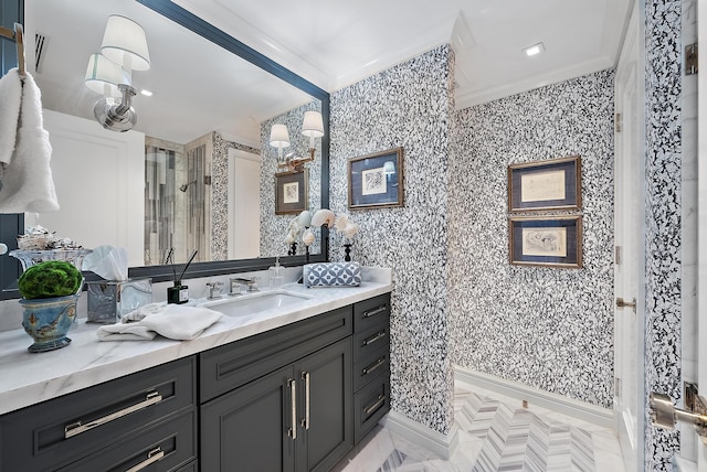 bathroom with a stall shower, wallpapered walls, crown molding, and vanity