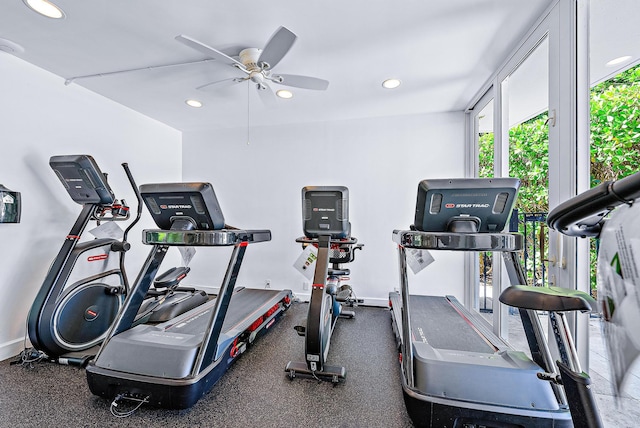 workout area featuring baseboards, ceiling fan, and recessed lighting