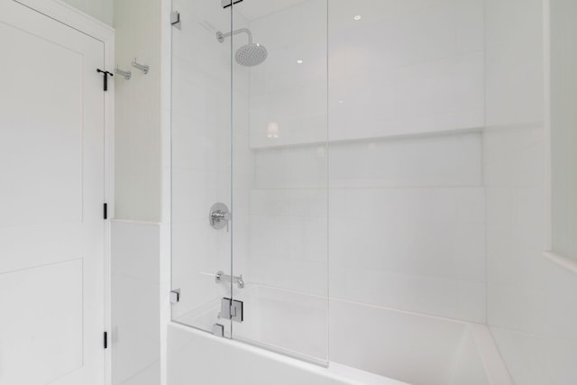 full bathroom featuring shower / bath combination with glass door