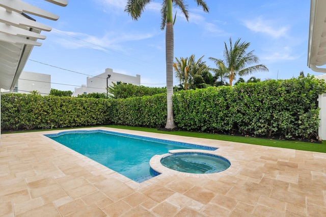 205 Greymon Dr, West Palm Beach, FL 33405 - view of pool with a pool with connected hot tub and a patio area
