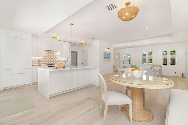 205 Greymon Dr, West Palm Beach, FL 33405 - dining room featuring light wood-type flooring and recessed lighting