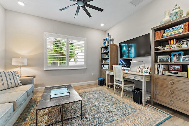 living room featuring recessed lighting, wood finished floors, a ceiling fan, visible vents, and baseboards