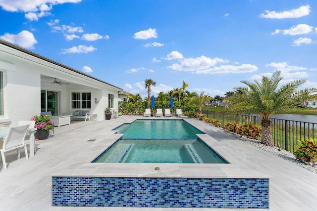 view of pool featuring a fenced in pool, a ceiling fan, a patio, an in ground hot tub, and fence