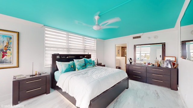 bedroom with visible vents, a ceiling fan, ensuite bath, ornamental molding, and marble finish floor