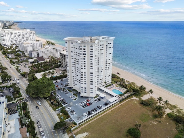 aerial view with a view of the beach and a water view