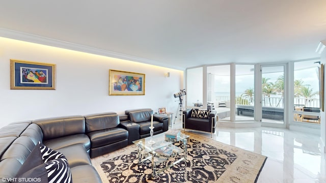 living room featuring ornamental molding, marble finish floor, and floor to ceiling windows