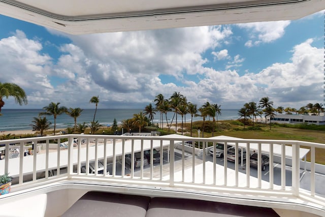 balcony featuring a water view