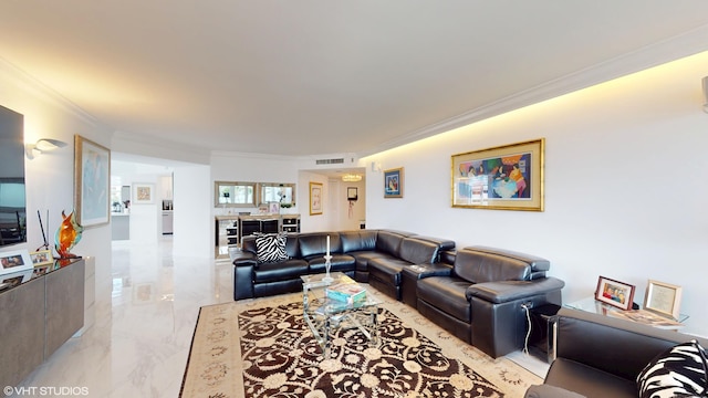 living area with marble finish floor, beverage cooler, visible vents, and ornamental molding