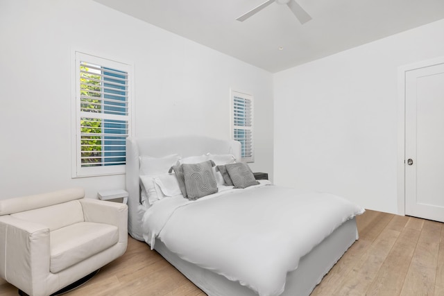 bedroom featuring a ceiling fan and light wood-style floors